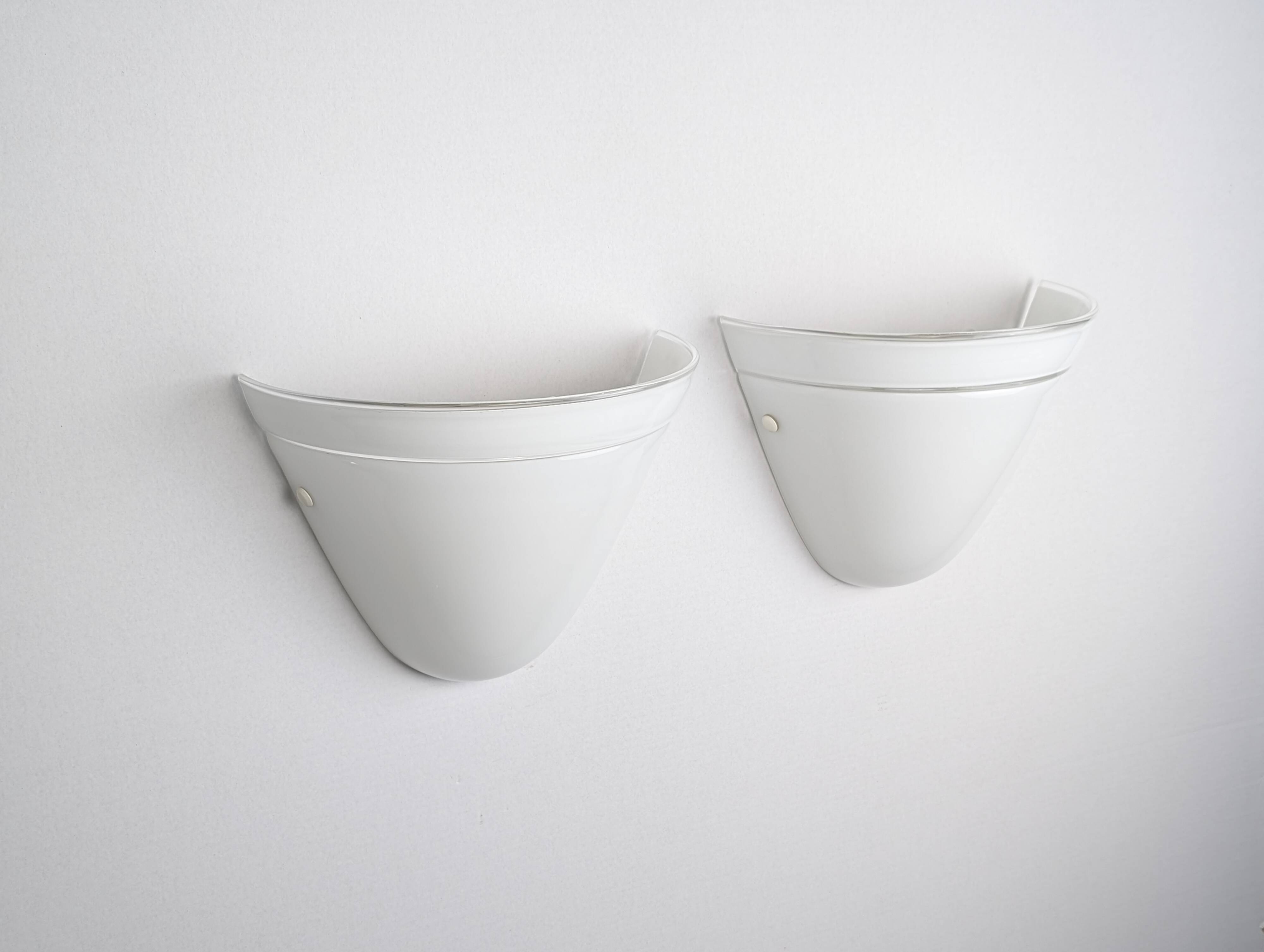 Pair of Murano Due white crystal wall lights, Italy, 1980s