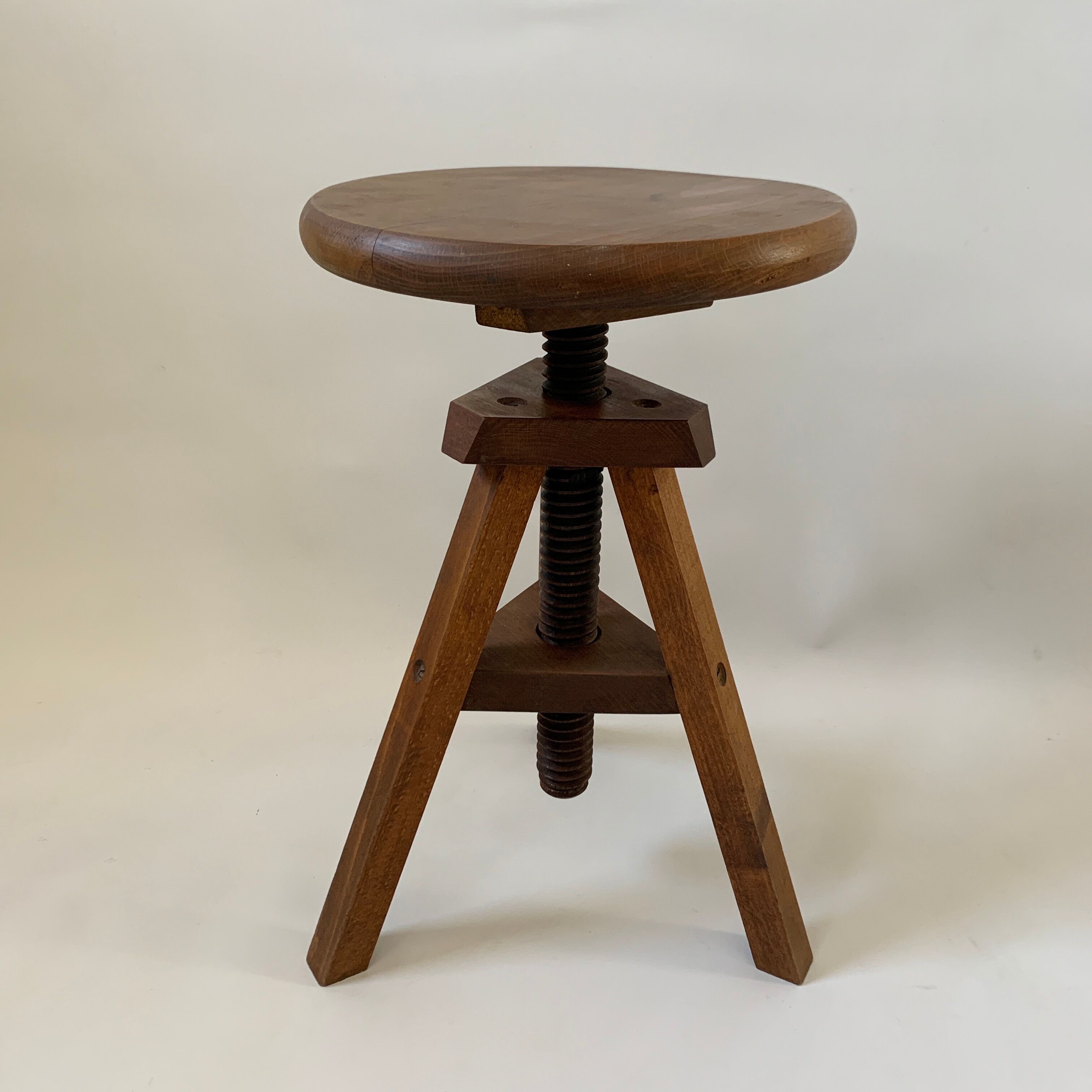 Wooden tripod stool with vintage screw