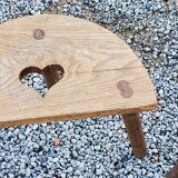Pair of shepherd's stools in tripod oak décor in the heart