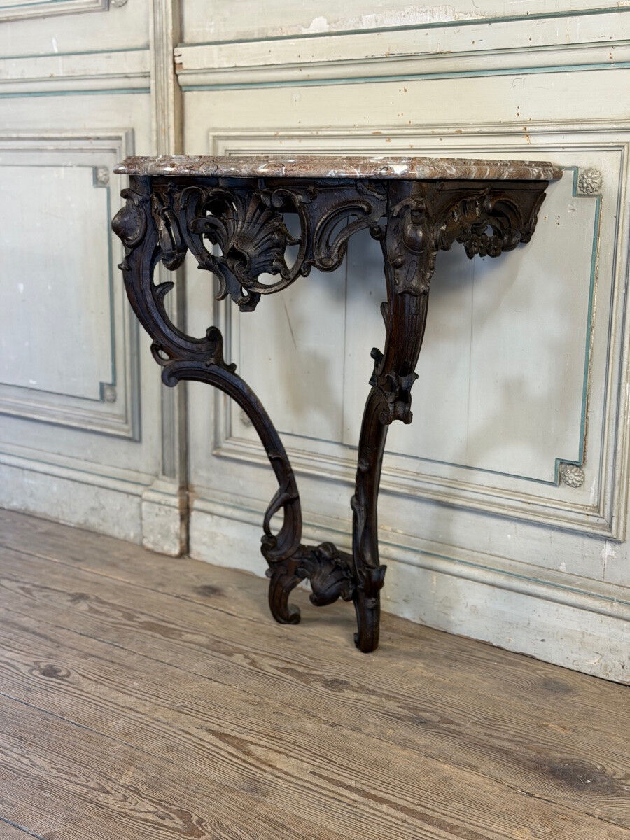 Console Louis XV en chêne sculpté, patine noire, XVIIIeme siècle
