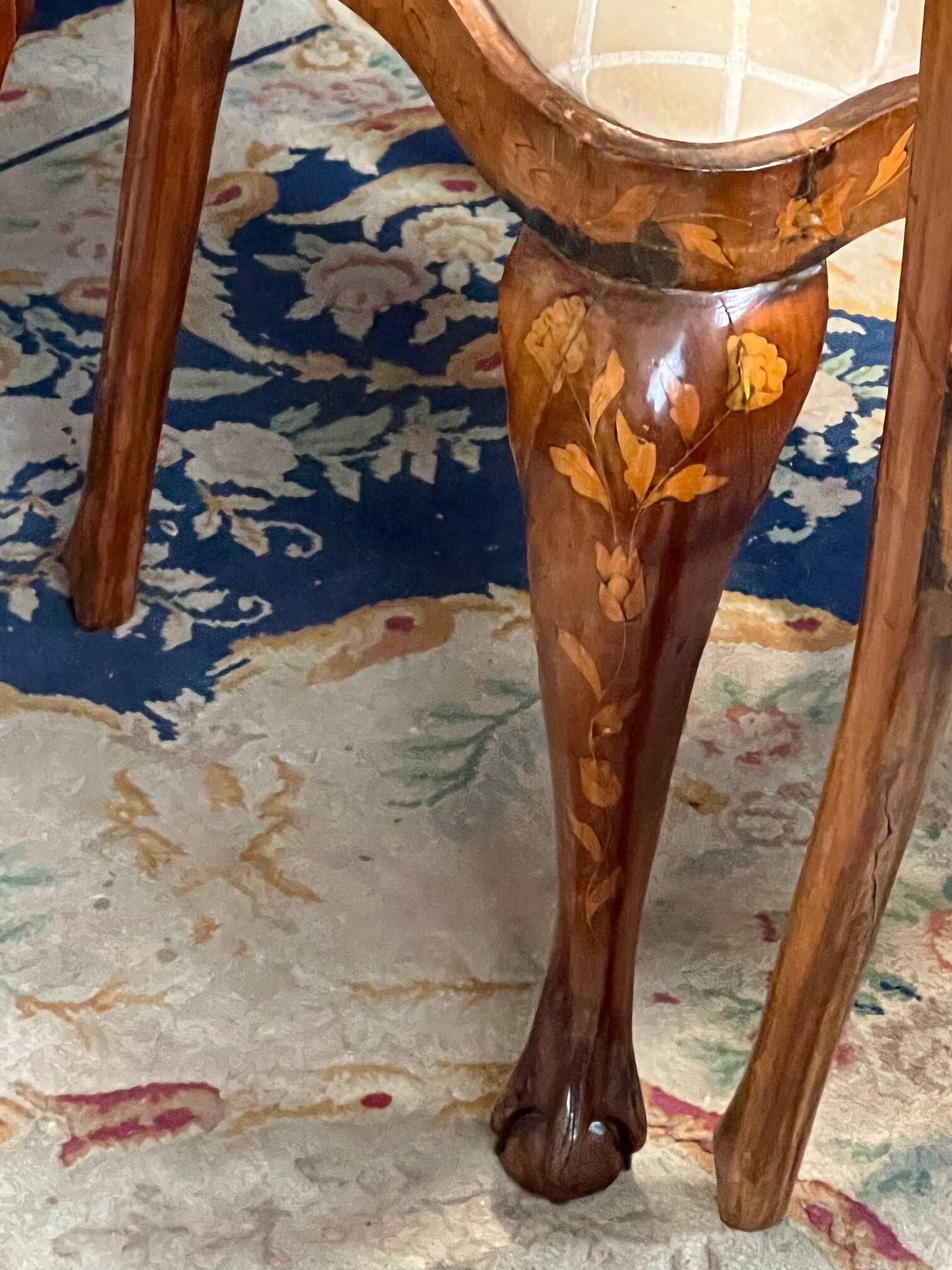 Set of two armchairs and six chairs. Marquetry with precious wood species.