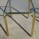 Nested table in gold metal and glass