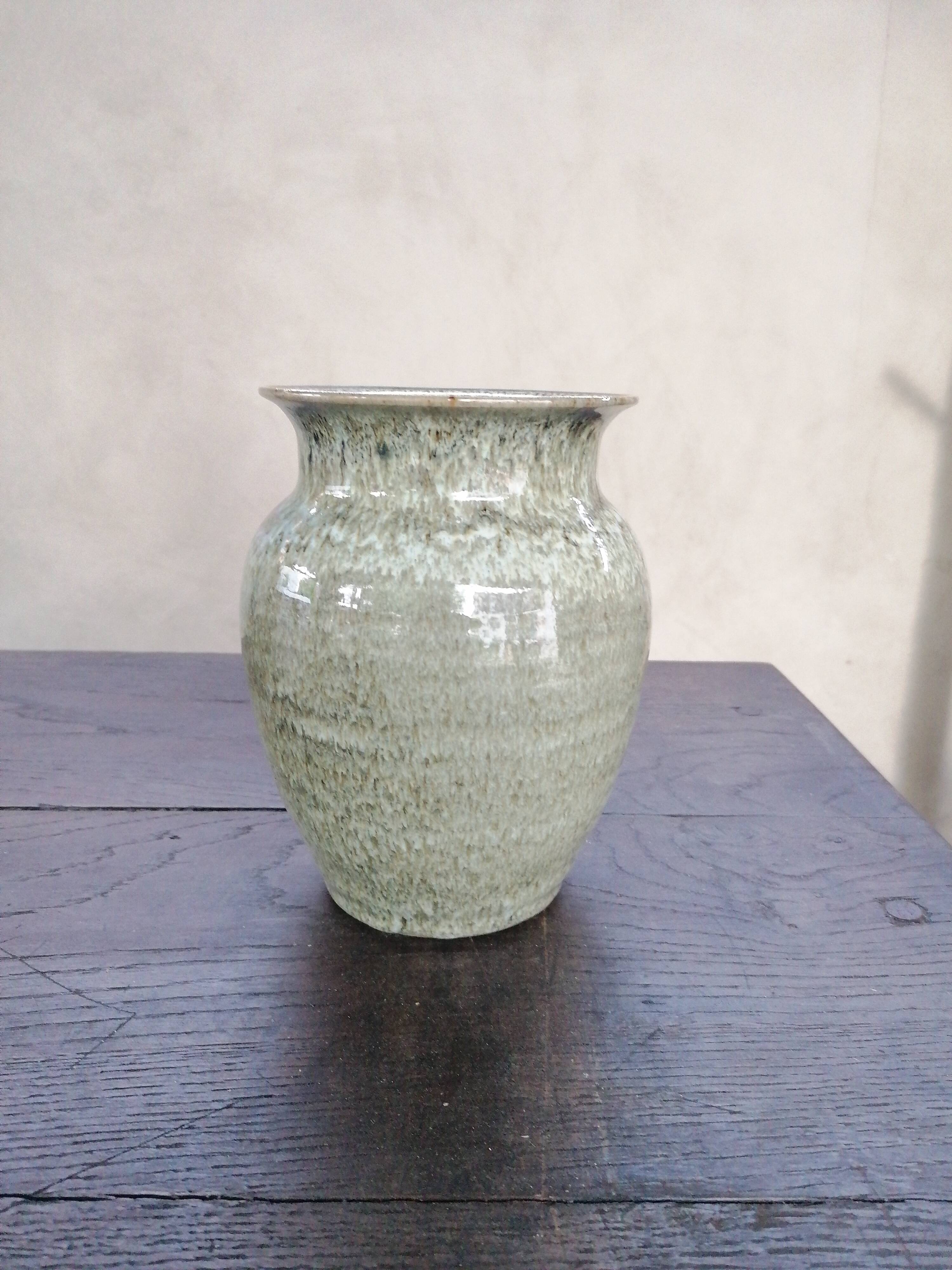 Green/pink speckled ceramic vase
