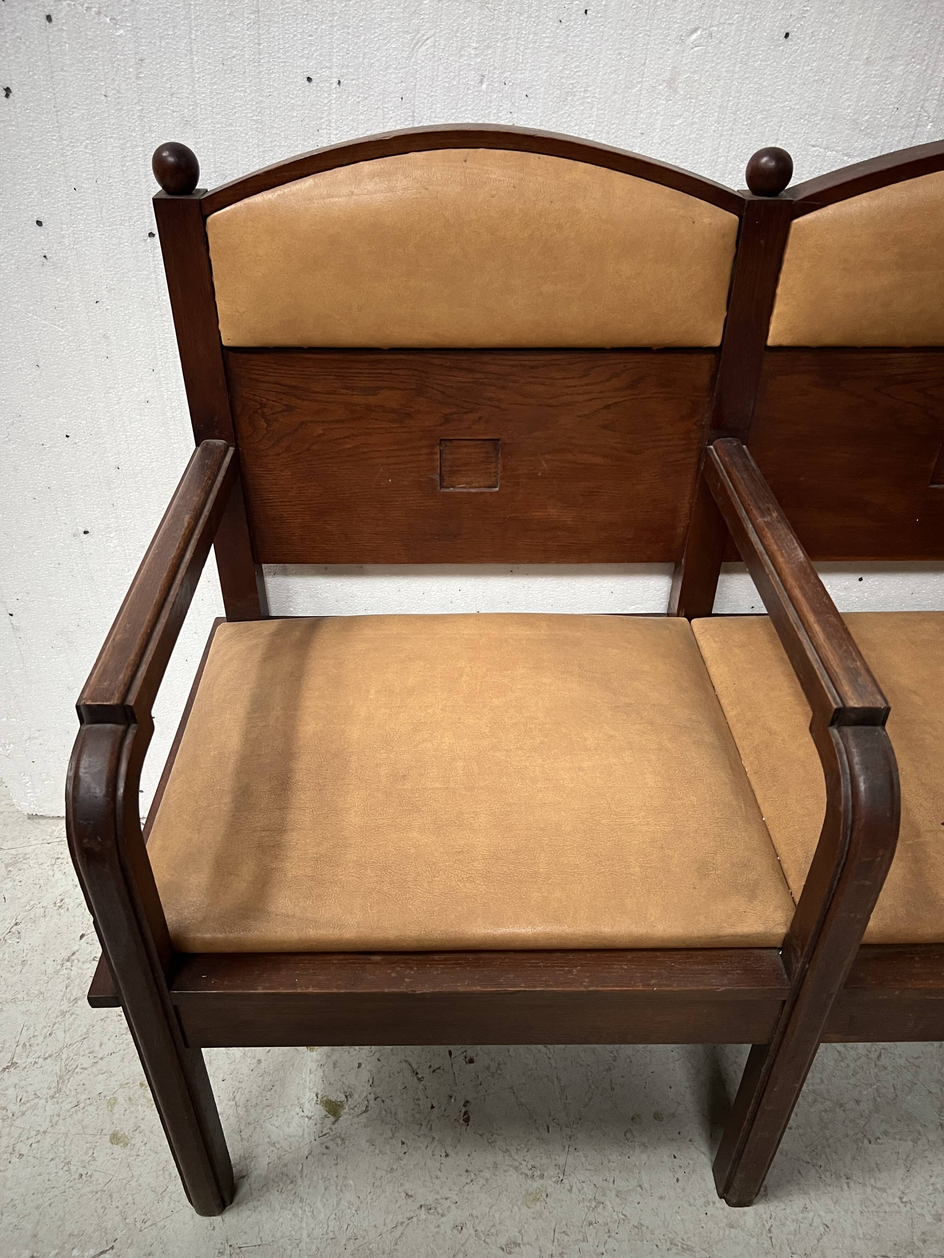 Art Deco two-seater bench in solid mahogany, 20th century.