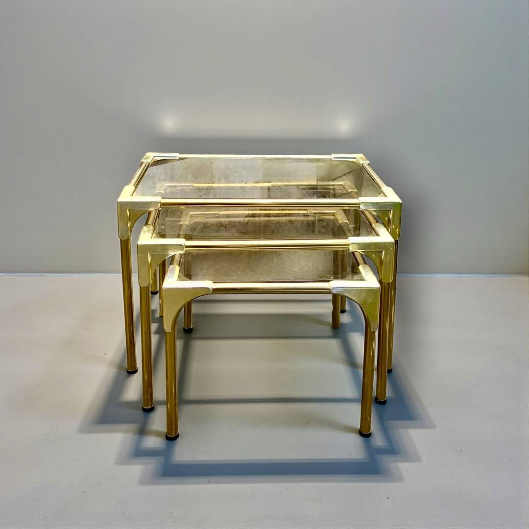 Trio of nesting tables in gold, smoked safety glass, 1970s