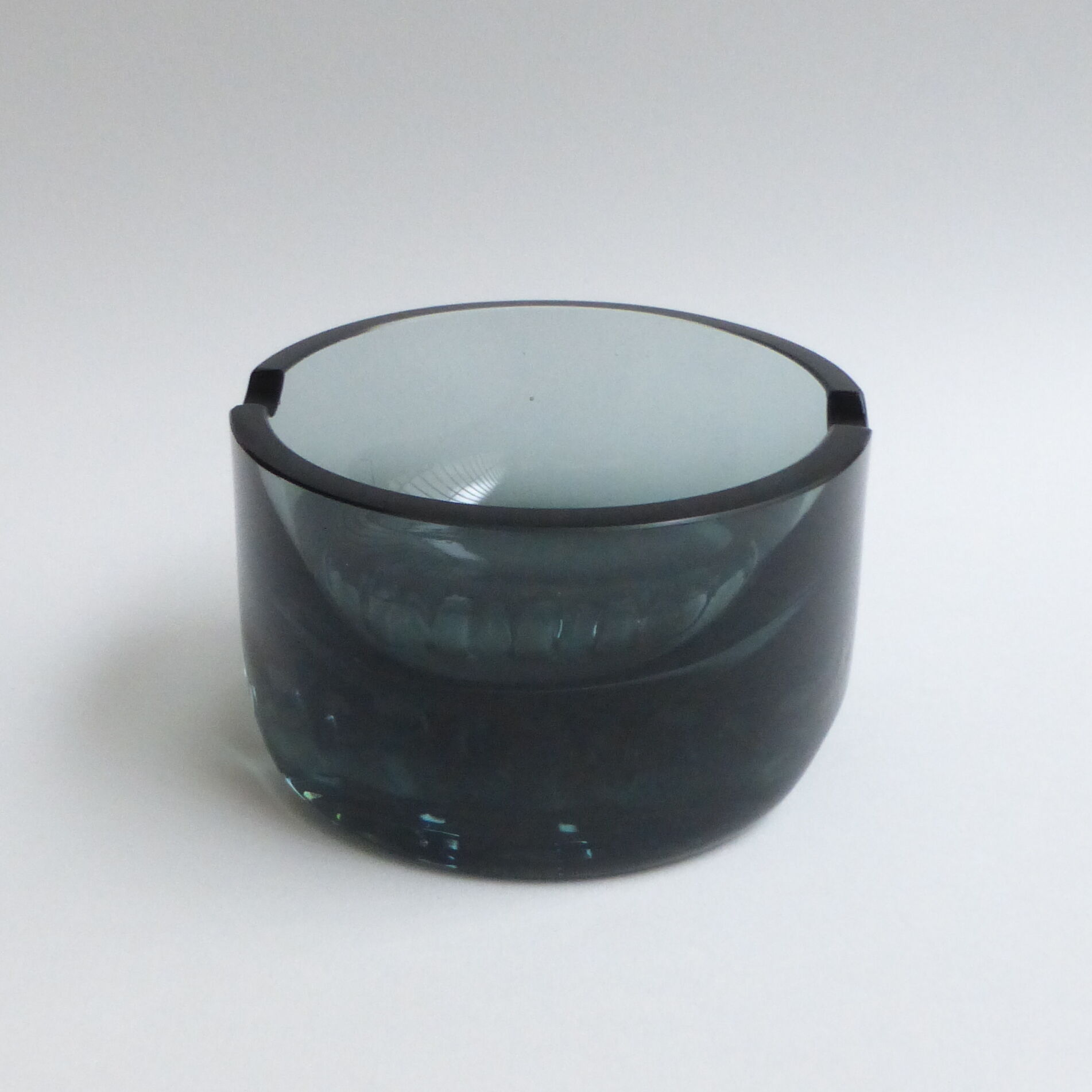 Scandinavian ashtray in 1970's moulded smoked glass