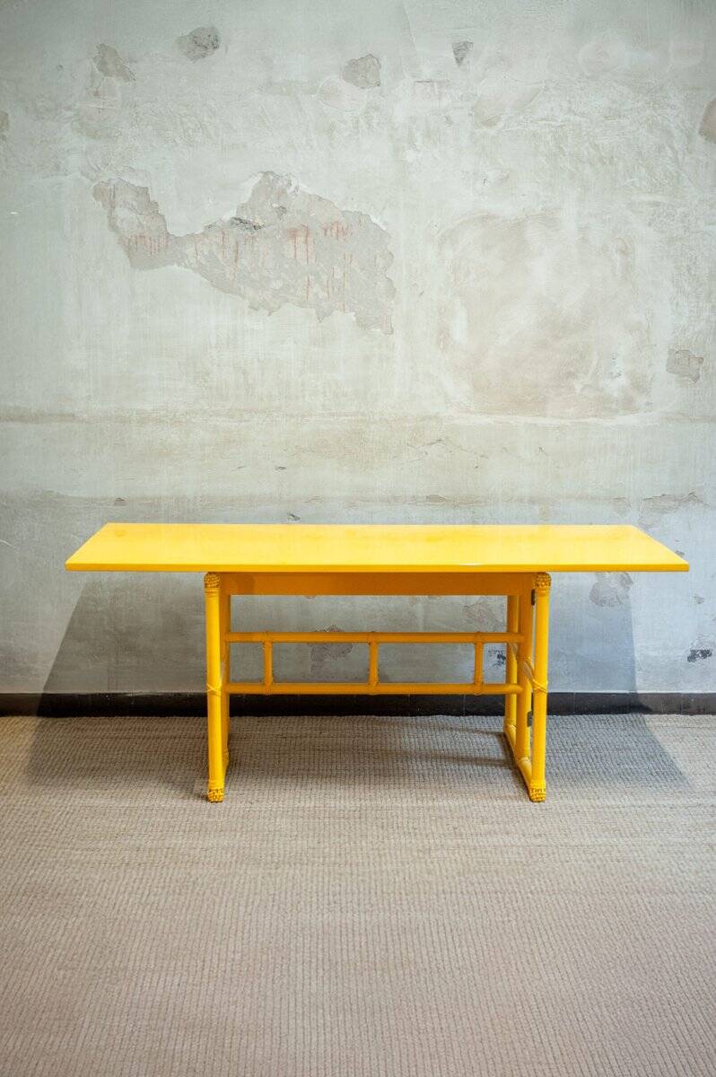 Yellow lacquered console with a flip-top surface by McGuire San Francisco, 1970s.