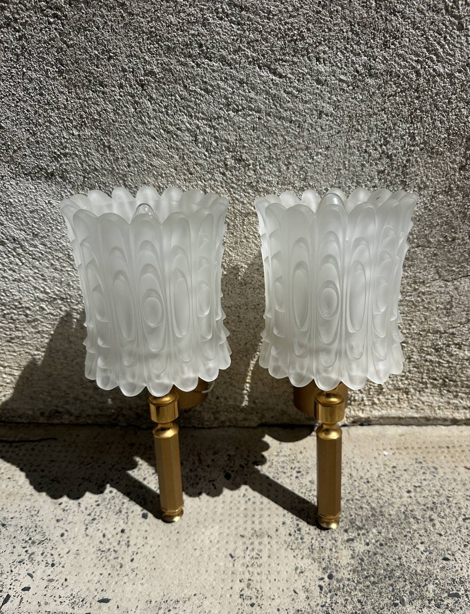Old pair of wall sconces by Maison Lunel in brass and glass.