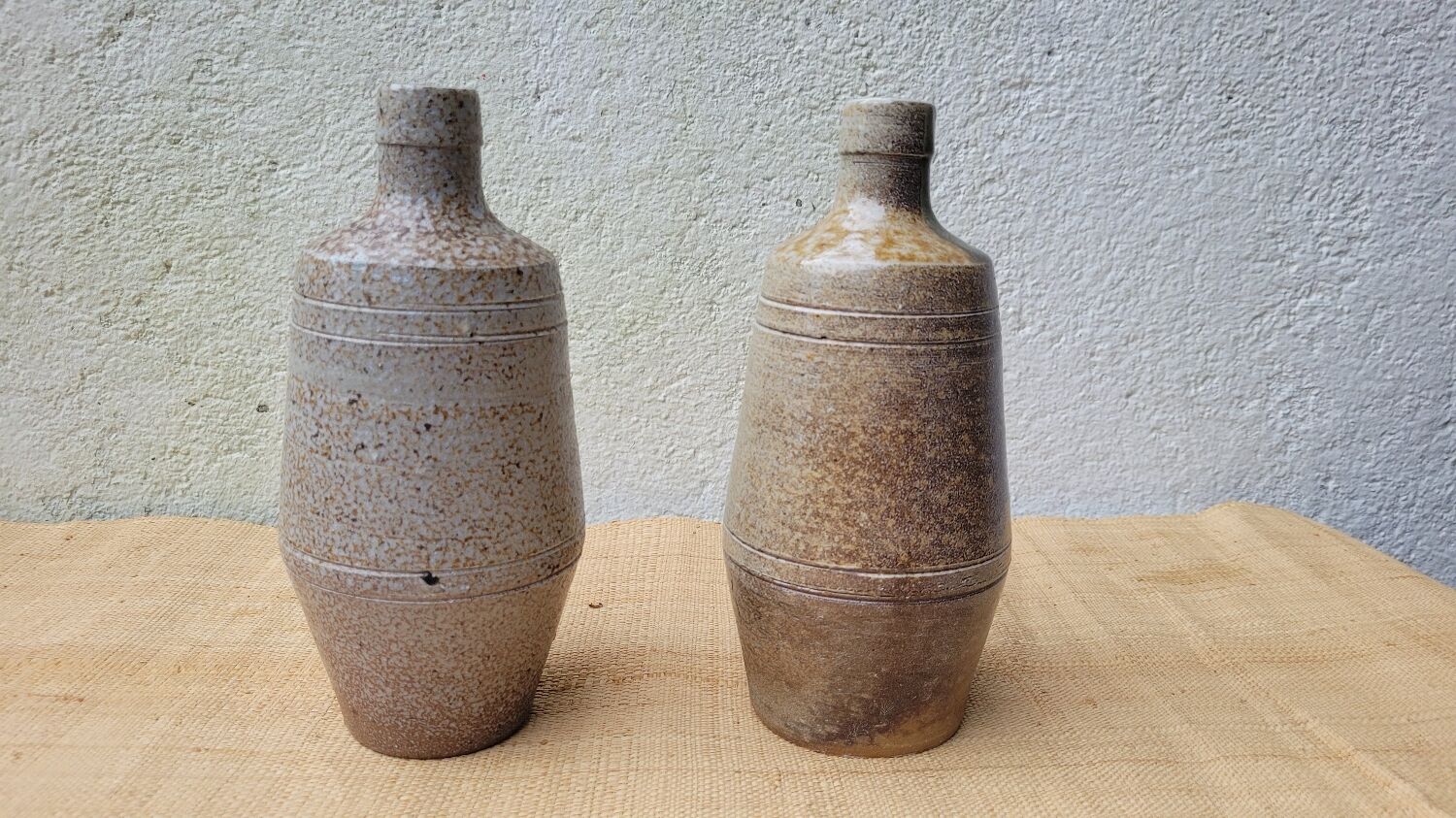 2 stoneware bottles