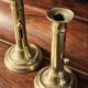 Pair of brass push-button candlesticks