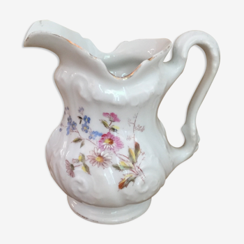 Old porcelain milk pot