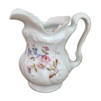 Old porcelain milk pot