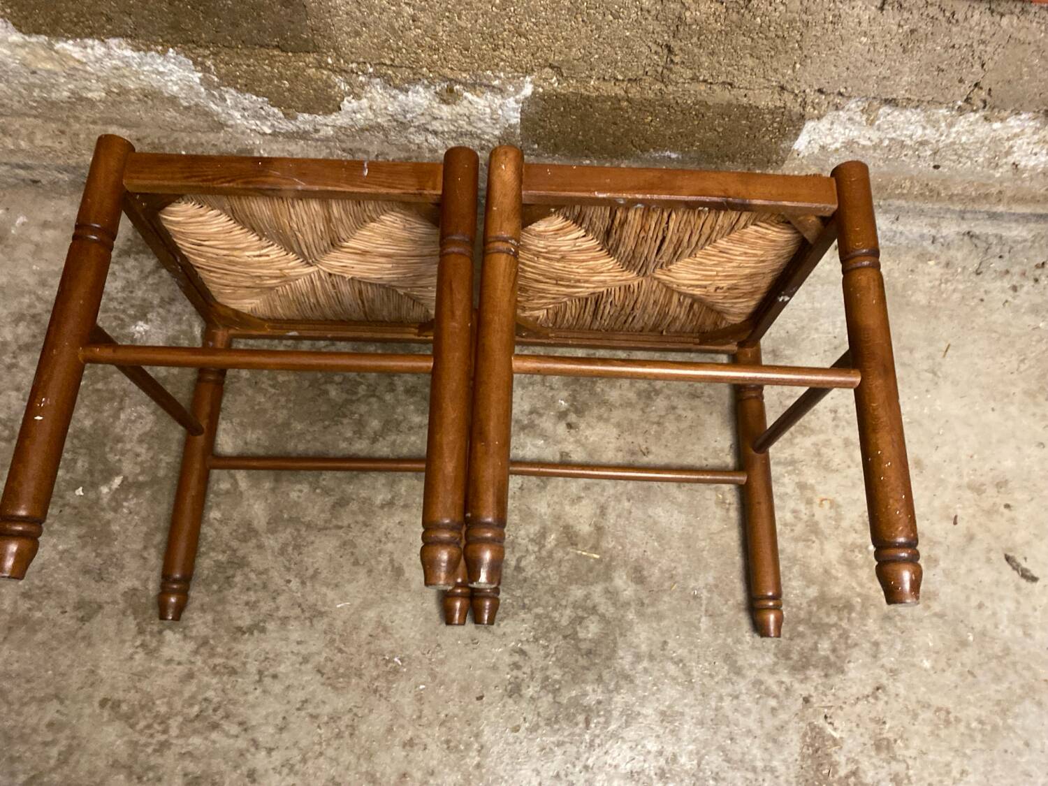 Pair of vintage wooden stools with woven straw seats