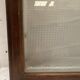 Wall display case with a solid oak door