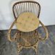 Set of 3 chairs and a rattan armchair.