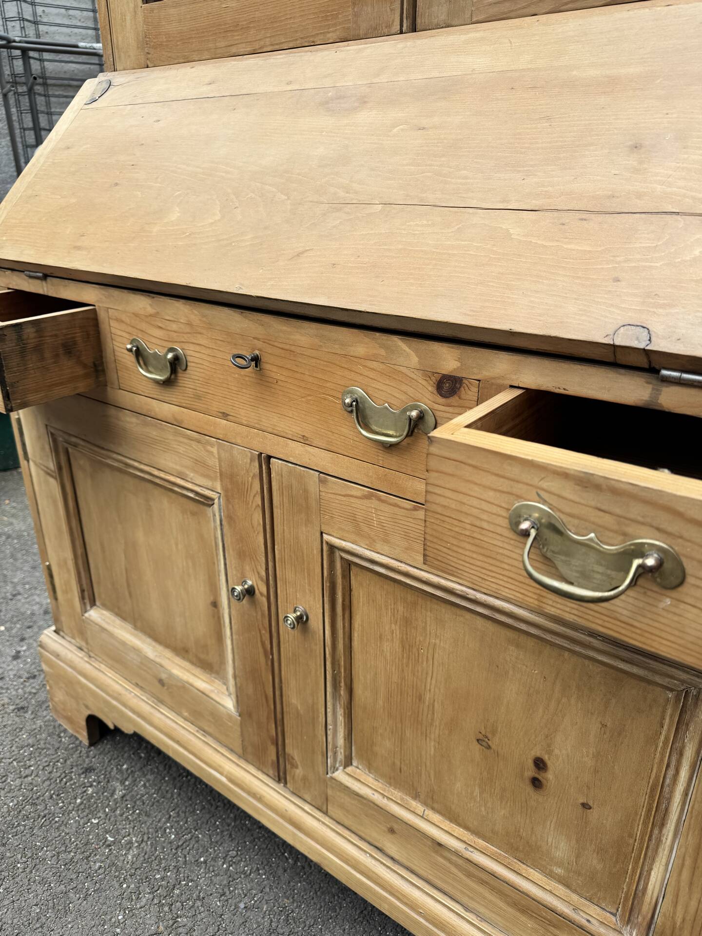 Showcase secretary with two bodies, English, in raw pine – around 1900