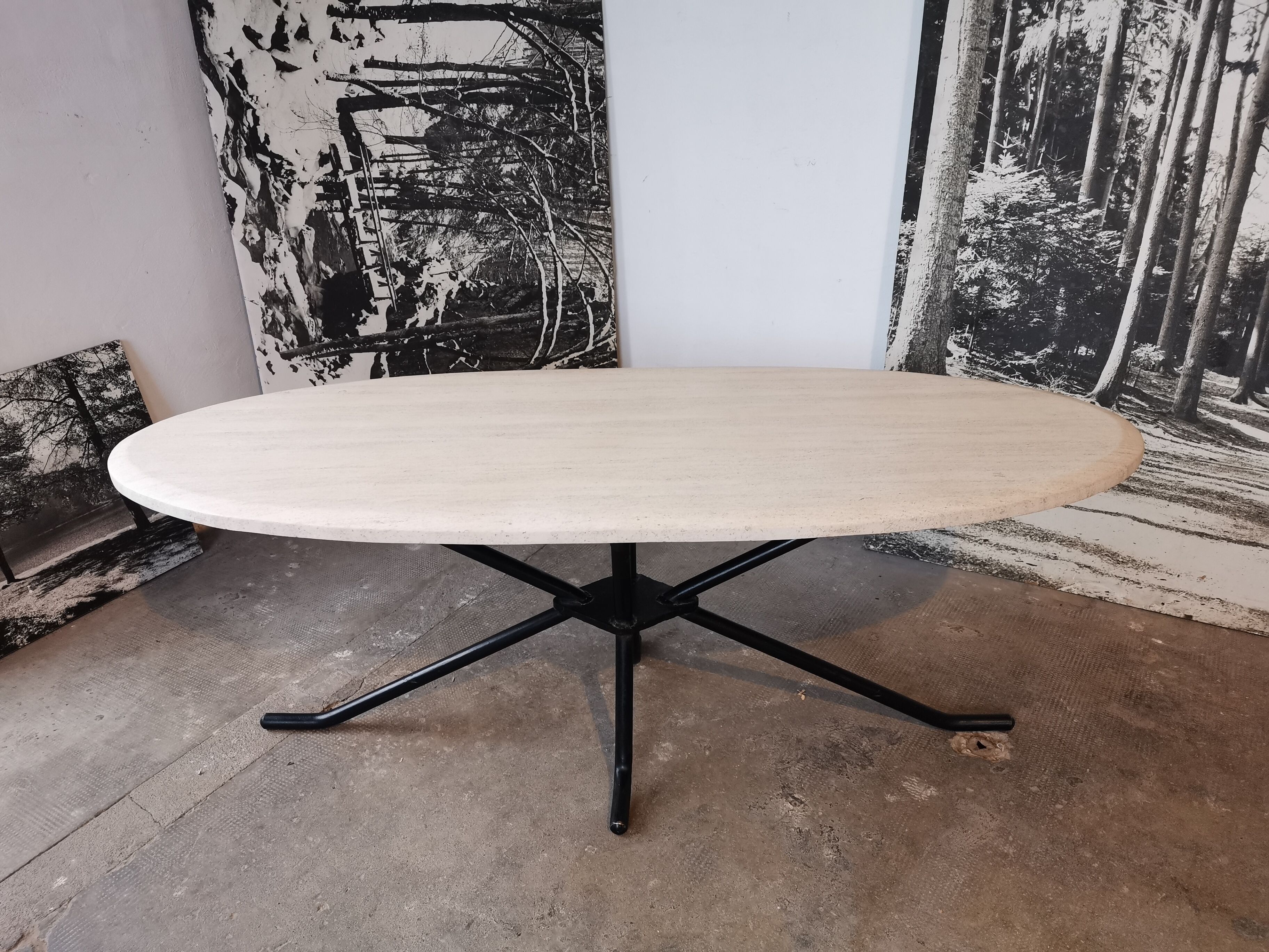 Large oval coffee table in travertine and metal