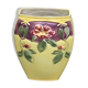Yellow glazed ceramic slip vase with hawthorn pink flower motif