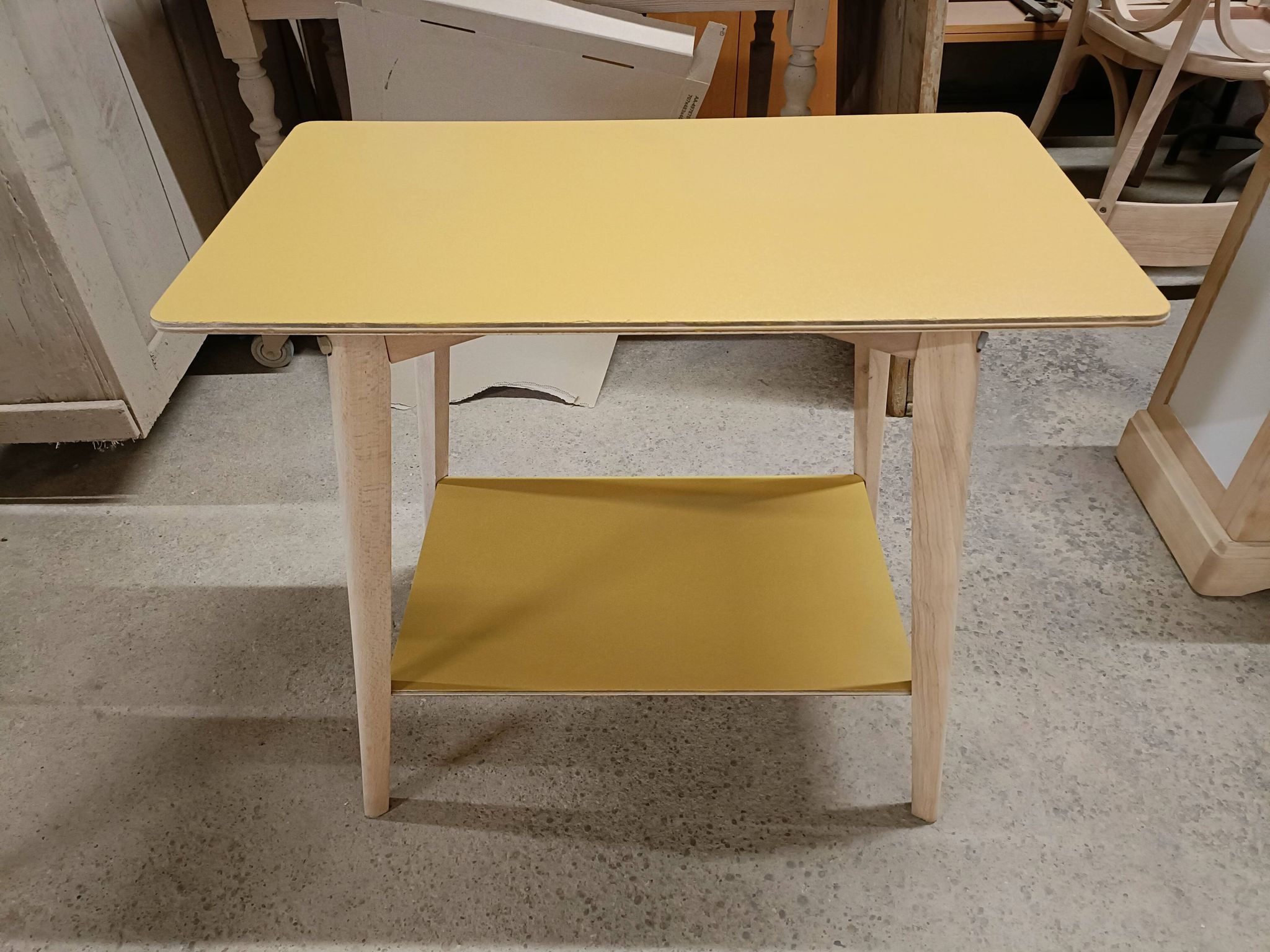 Vintage side table with tapered legs