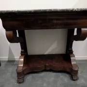 Console restored in flamed mahogany, Sainte-Anne marble, claw feet.