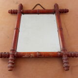 Old mirror in turned wood