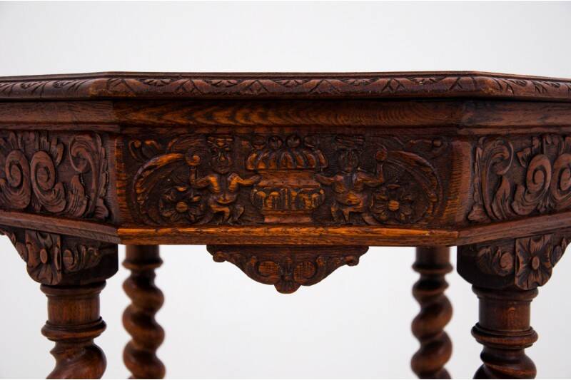 Carved table, France, circa 1910.