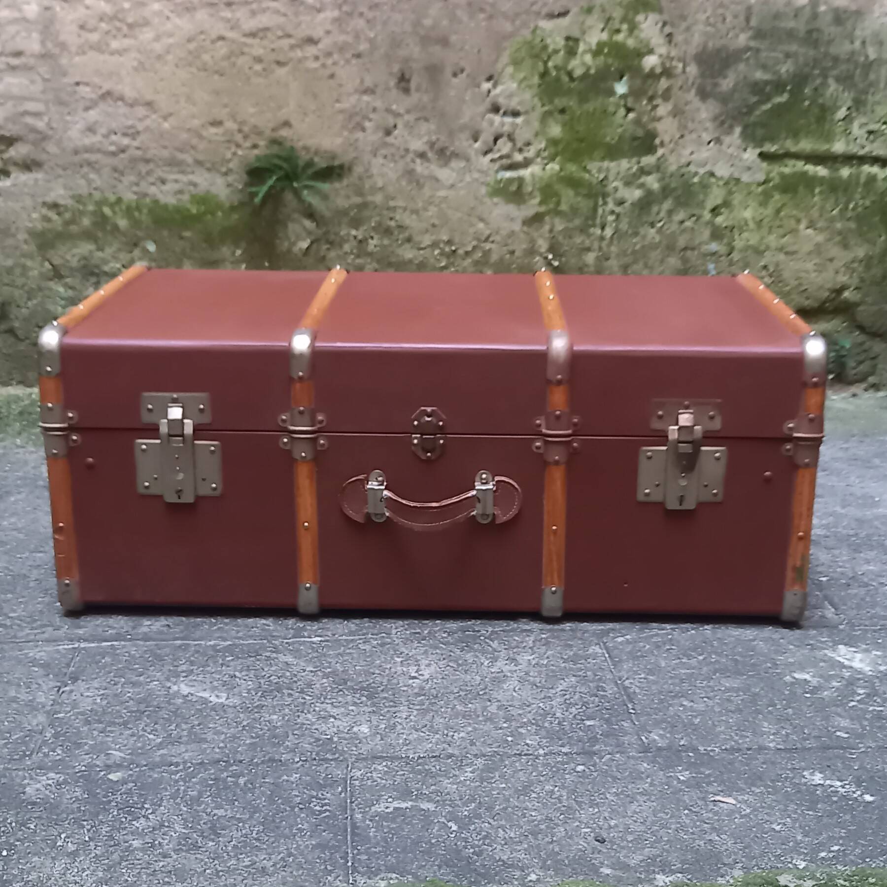 Old trunk, travel suitcase, with carrying handles and interior lockers, wooden reinforcements