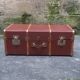 Old trunk, travel suitcase, with carrying handles and interior lockers, wooden reinforcements