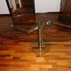 Glass and stainless steel dining table with 2-length system