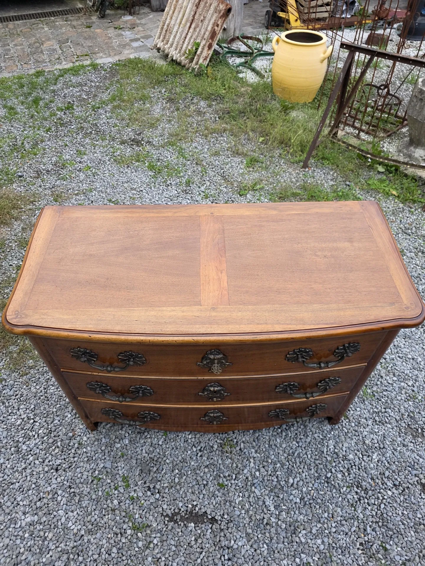 Curved Louis XV style chest of drawers in solid walnut