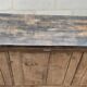 Old raw oak counter with black waxed top