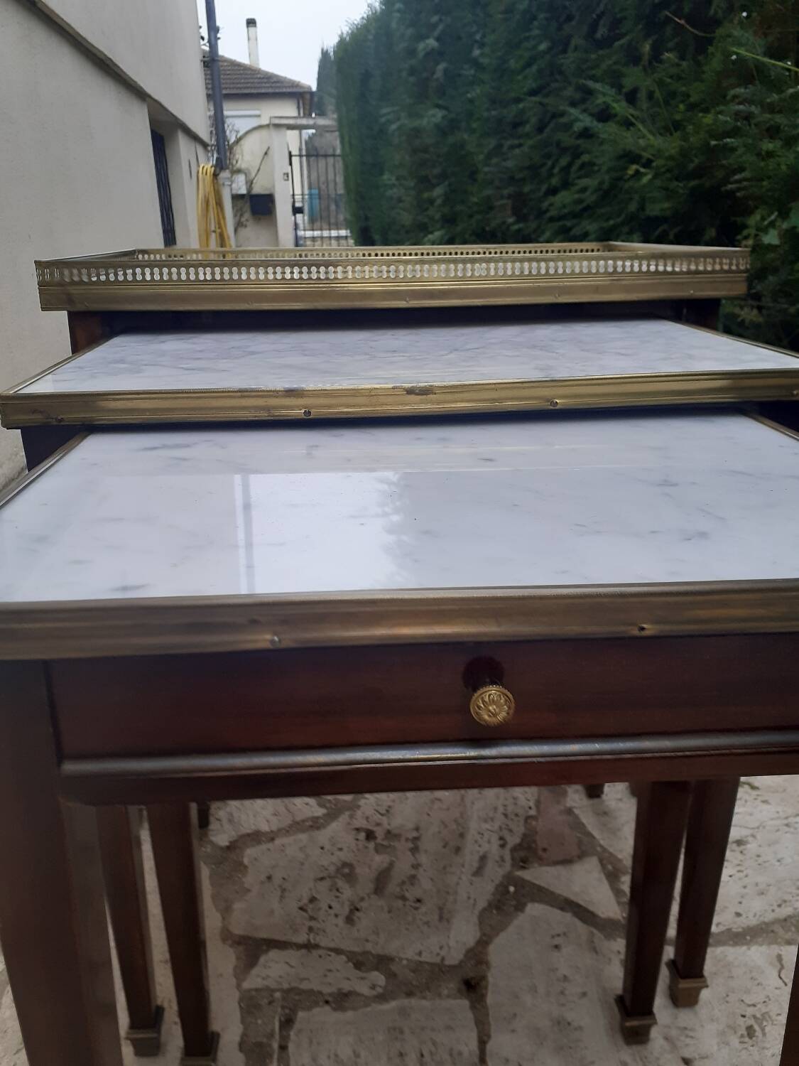 Set of three Louis XVI mahogany nesting tables