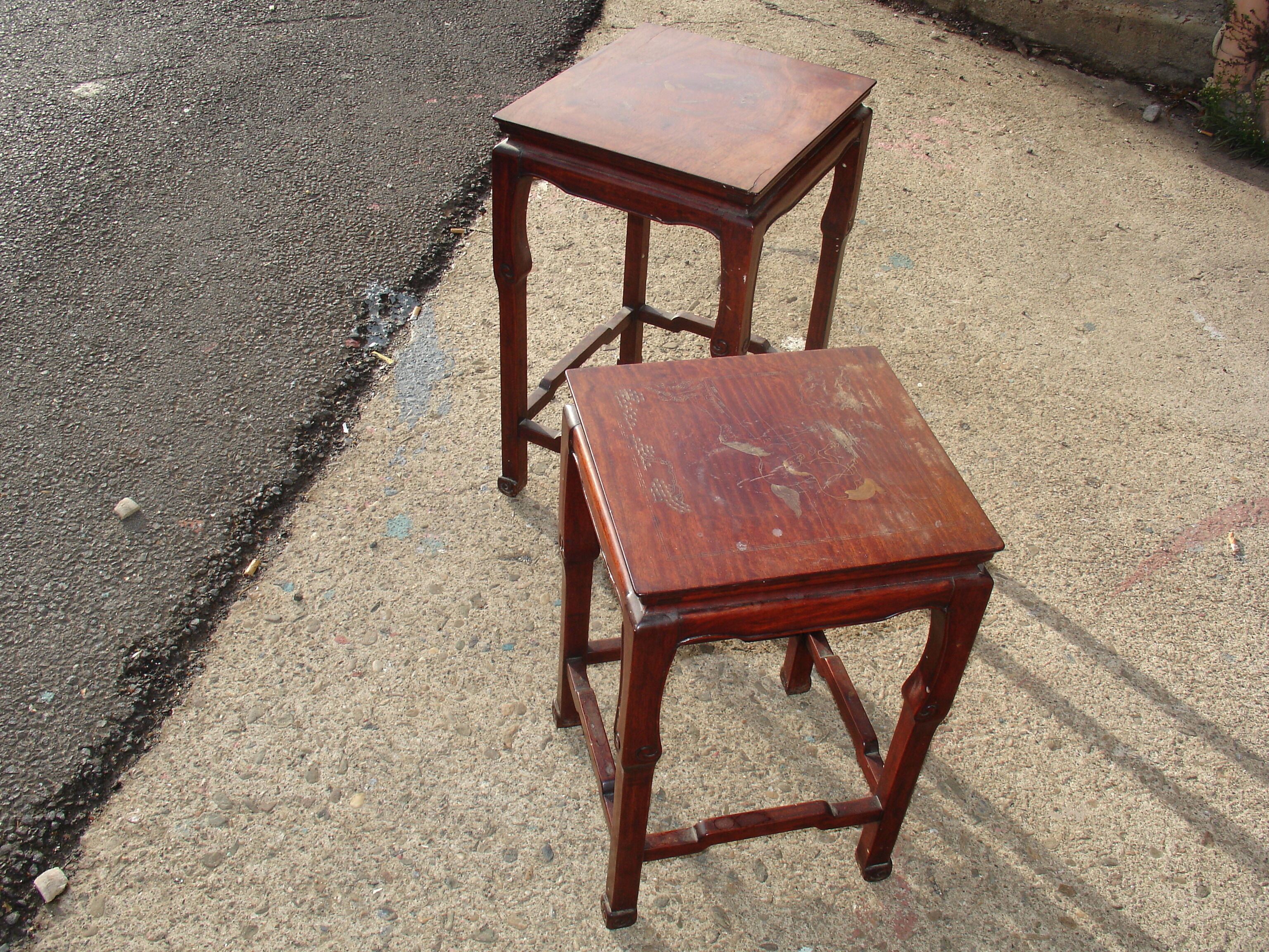 Nesting tables in ironwood with engraved decoration and gold highlights