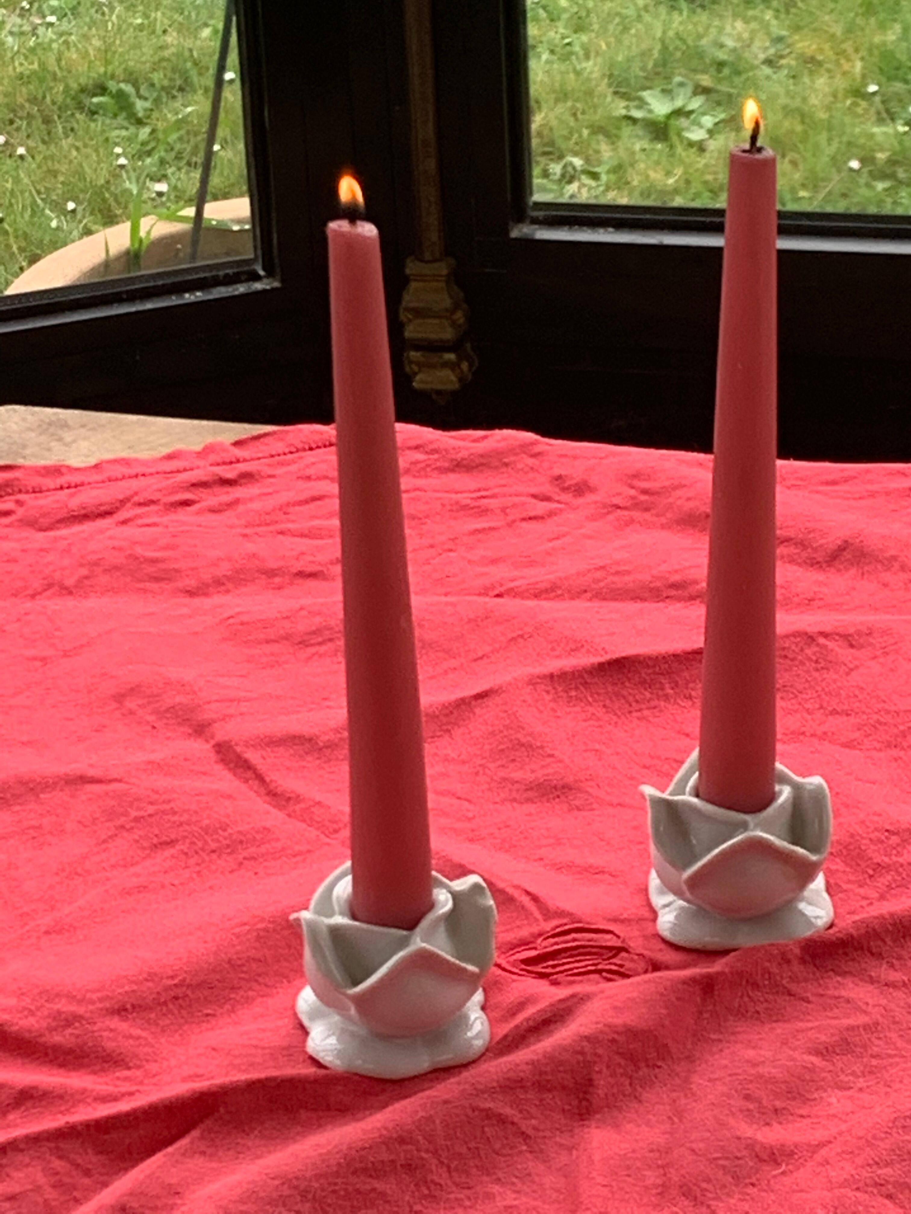 Two vintage white porcelain flower candle holders