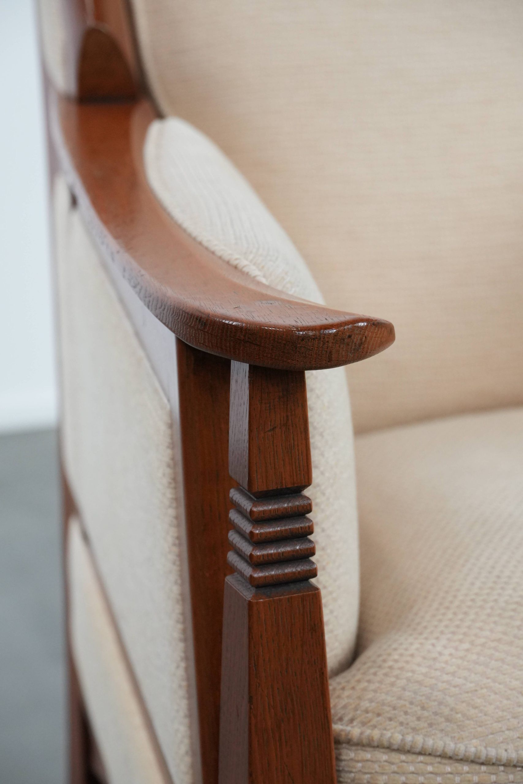 Art Nouveau design armchair with a luxurious light fabric upholstery