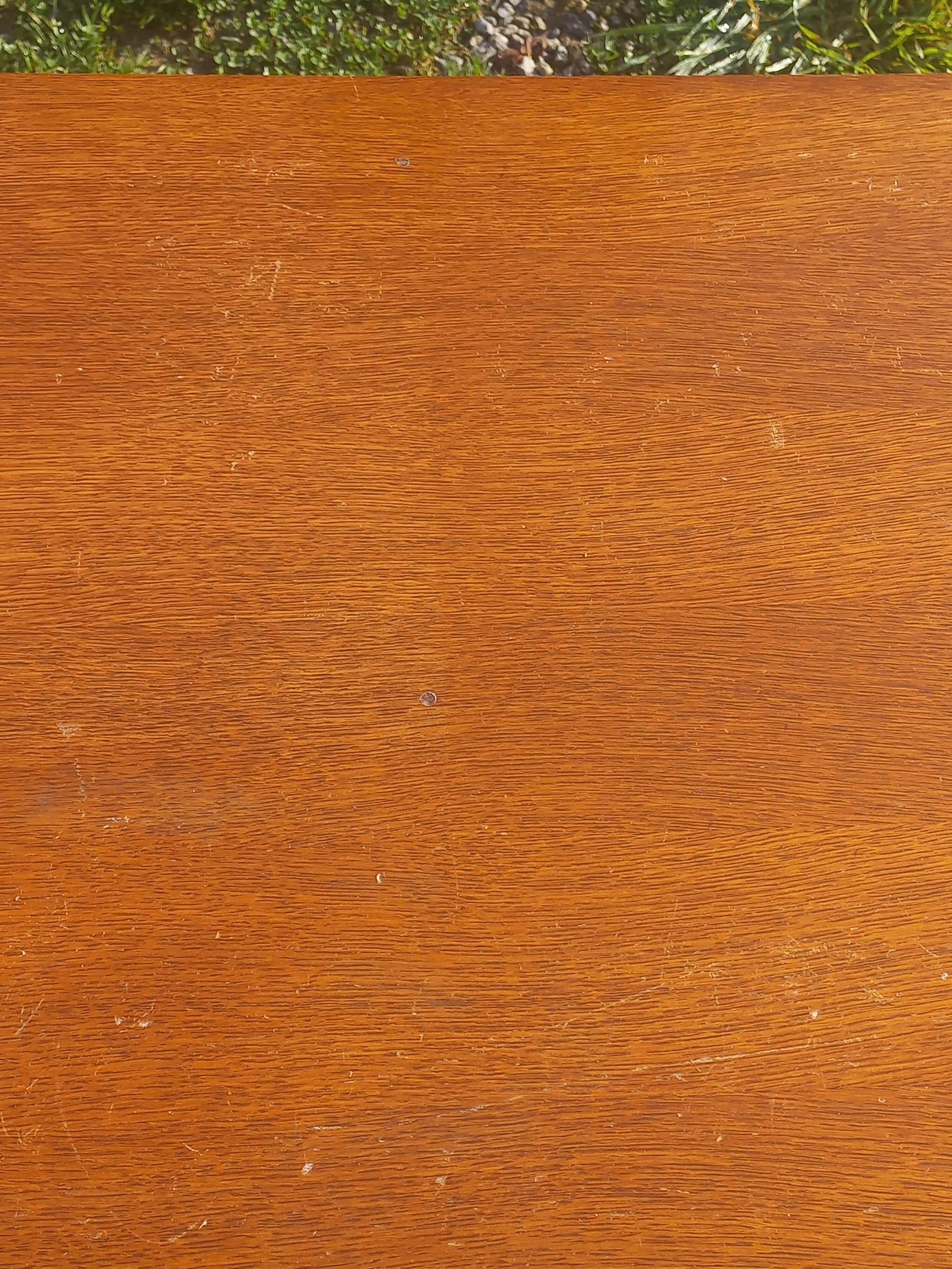 Vintage oak sideboard with splayed legs from the 1950s.