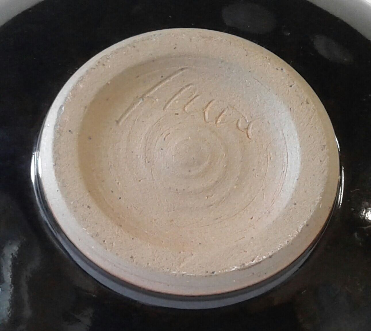 Enamelled sandstone cup