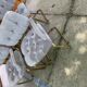 Set of 4 vintage 1970s dining chairs in gold brass and grey fabric.