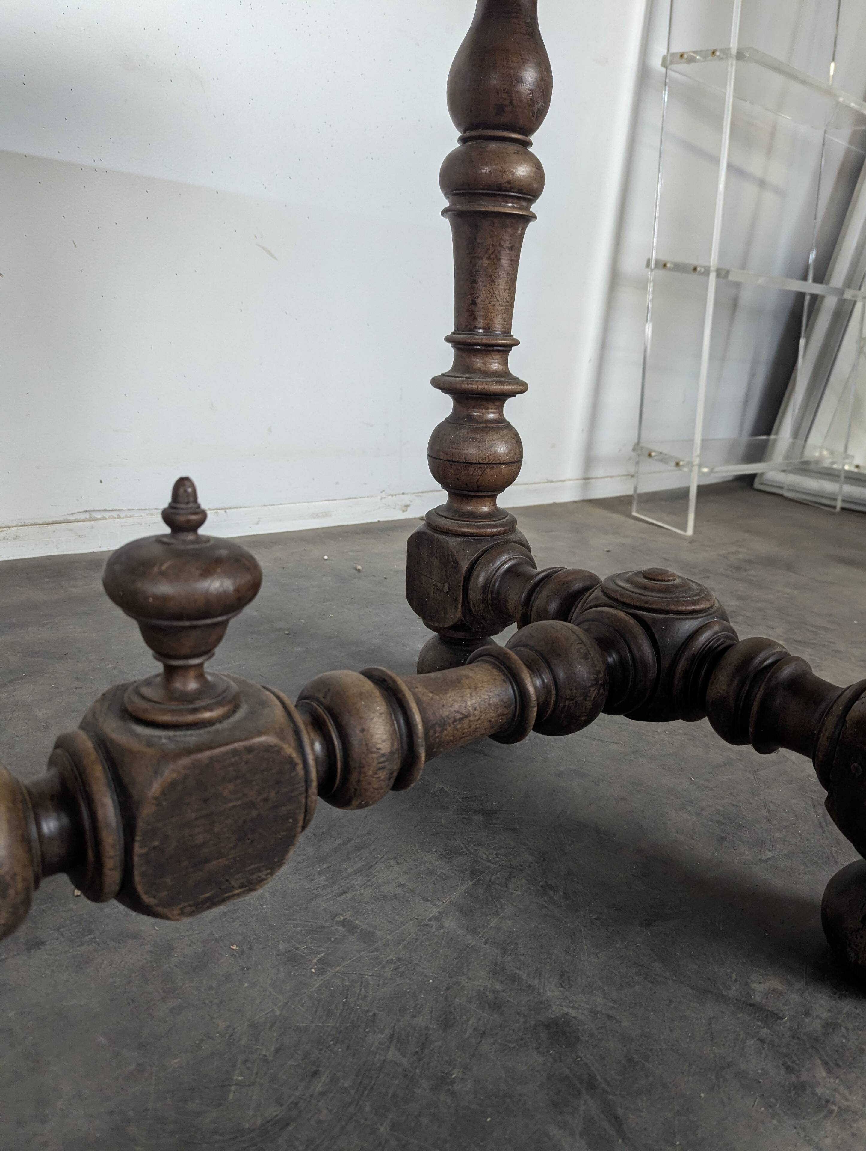 Louis XIII oak table with baluster legs and H stretcher.