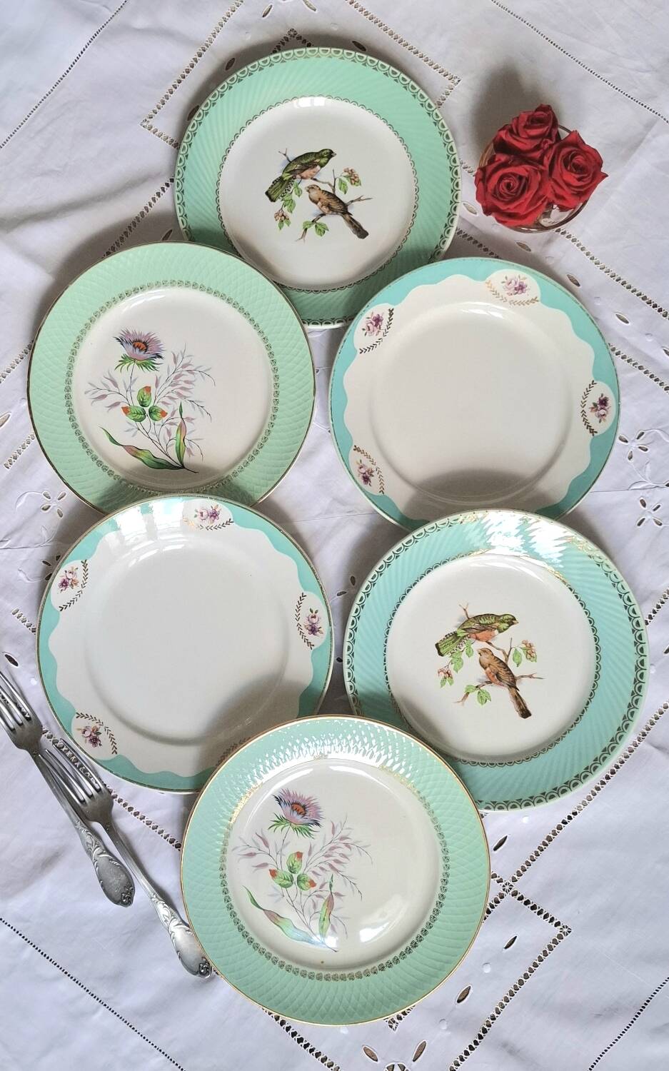 Old mismatched earthenware dinner plates