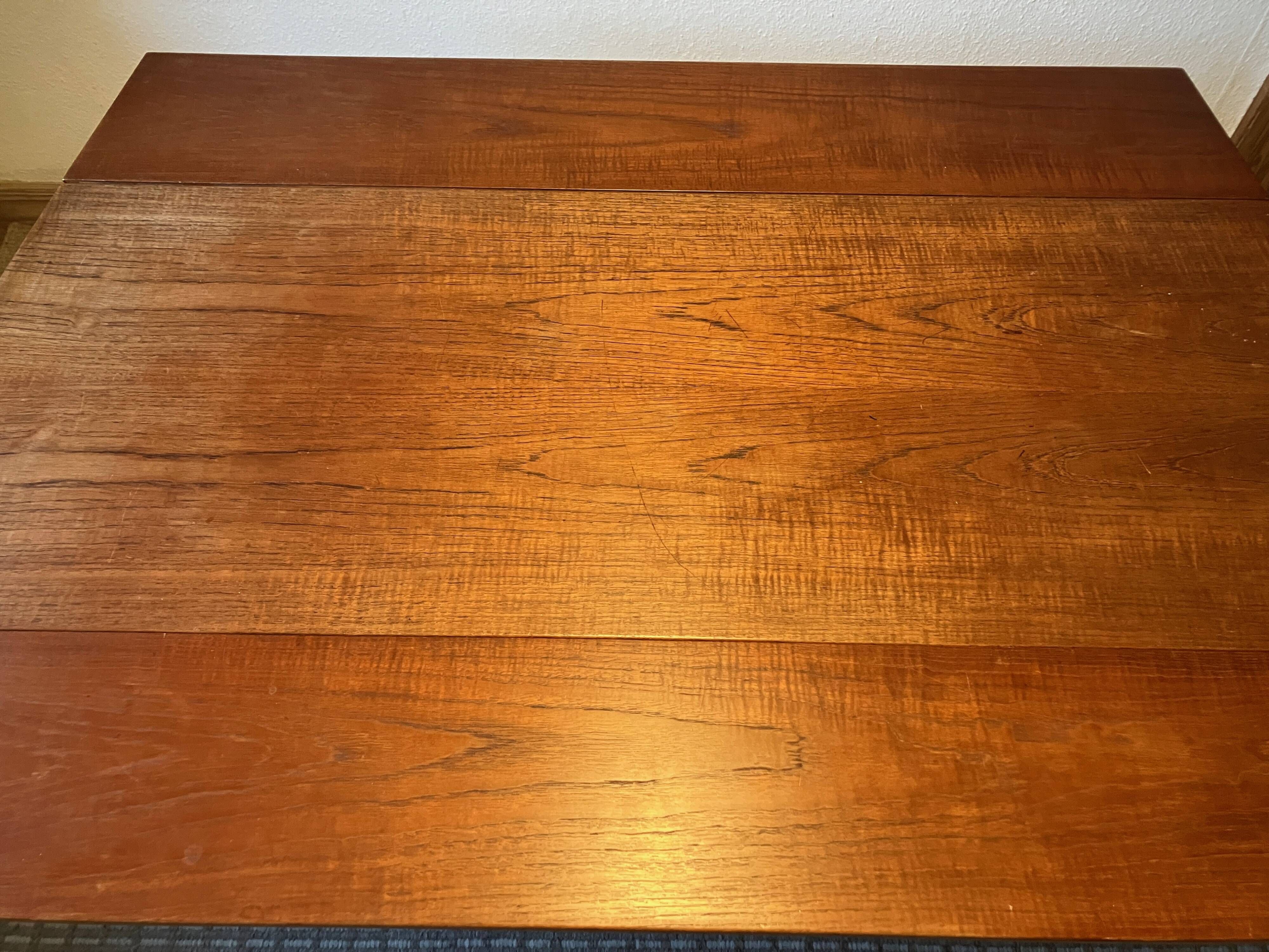Danish coffee table from the 1960s, in good original condition, teak wood, rattan. by HELTBORG MOBLER