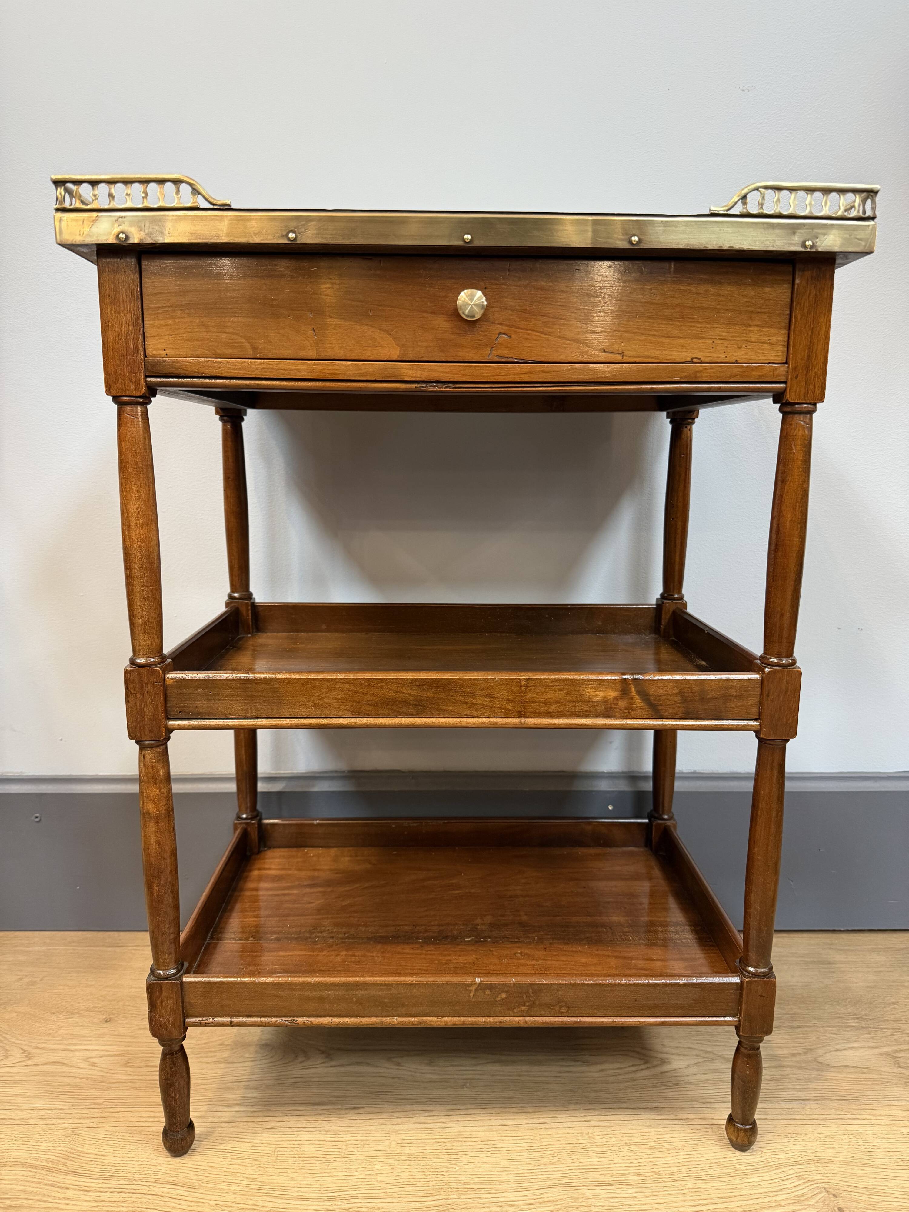 Small mahogany side table in Louis XVI style.