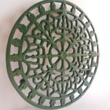 Vintage green cast iron trivet