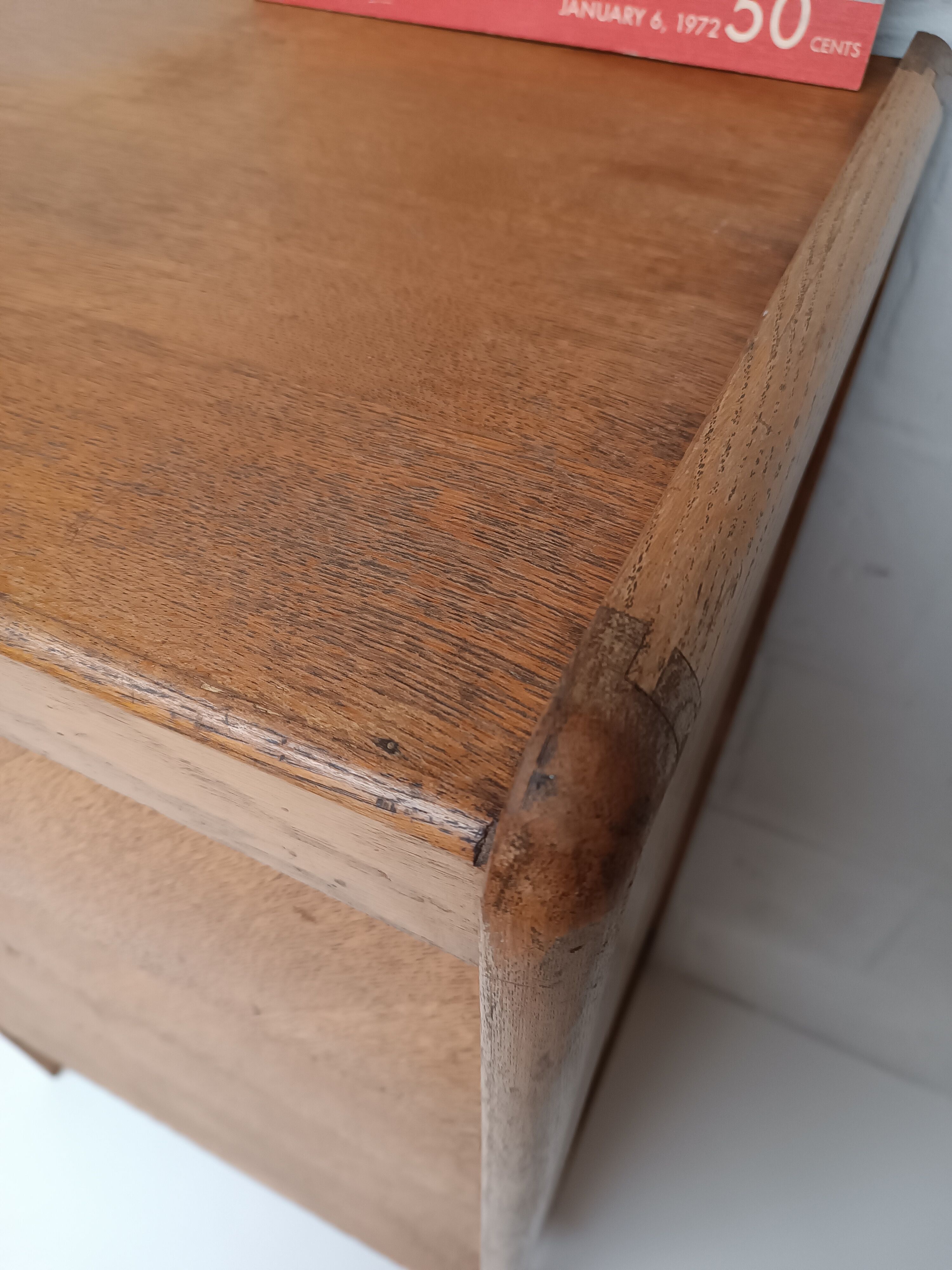 High wooden chest of drawers in the 50s