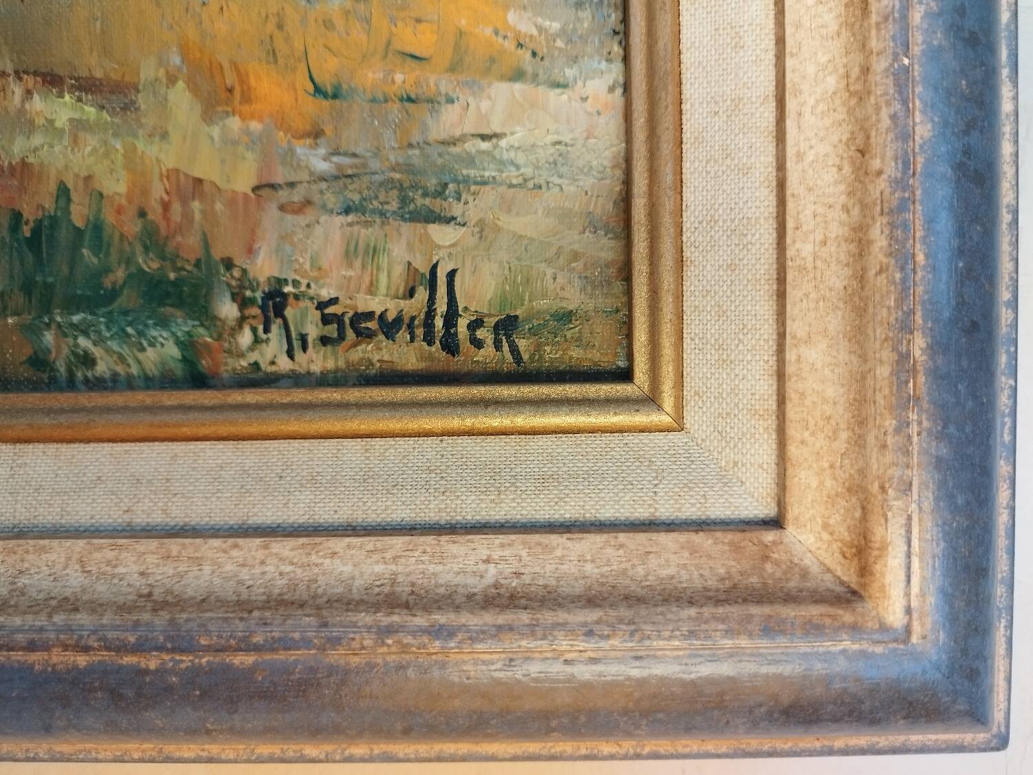 Oil on canvas "a Village in Brittany" signed by Raymond Scuiller