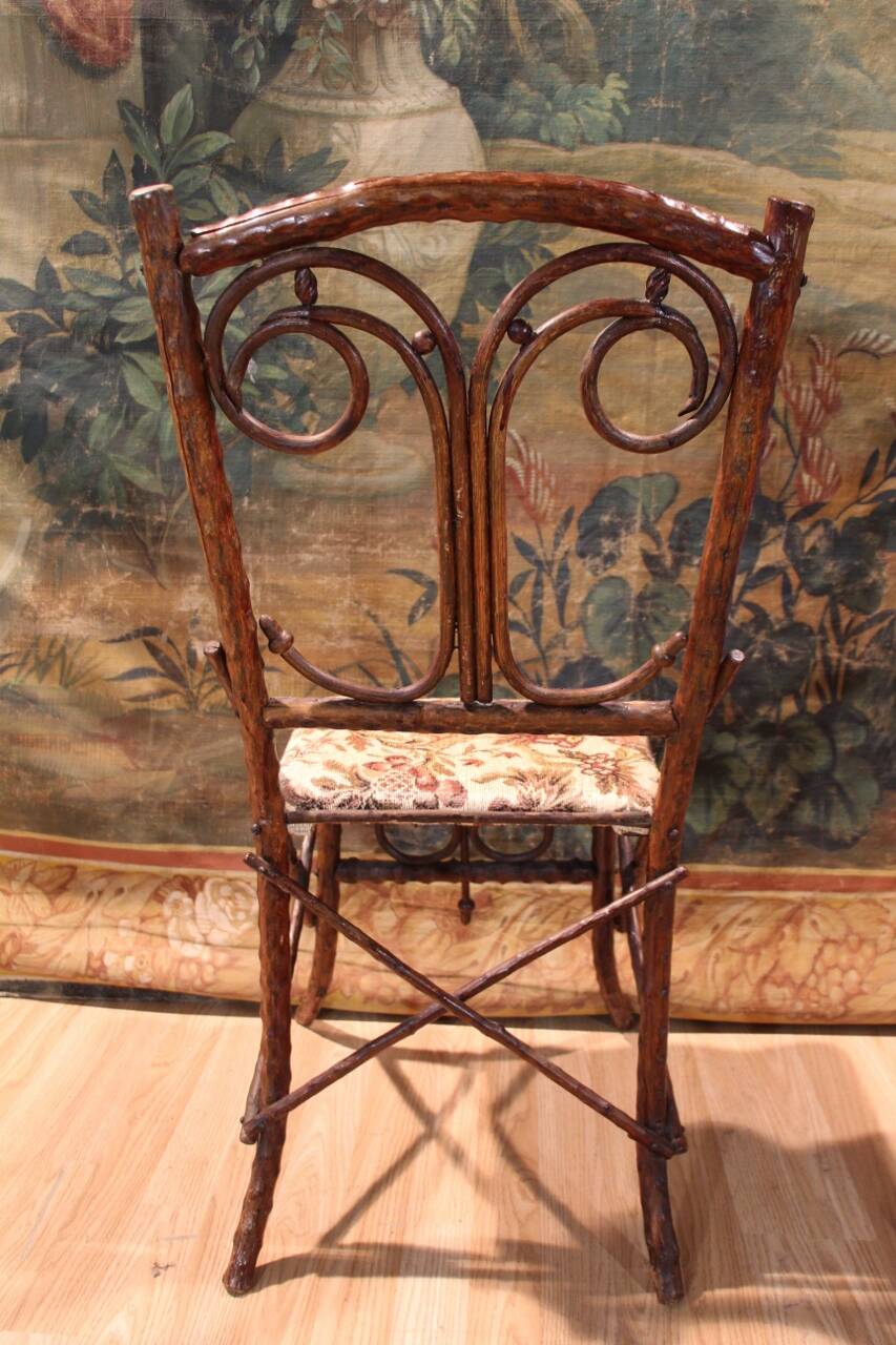 Folk art chair, black forest in branches
