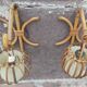 Pair of Louis Sognot rattan wall lights.