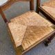 2 dining chairs in solid wood and rush, Chippendale ladder style.