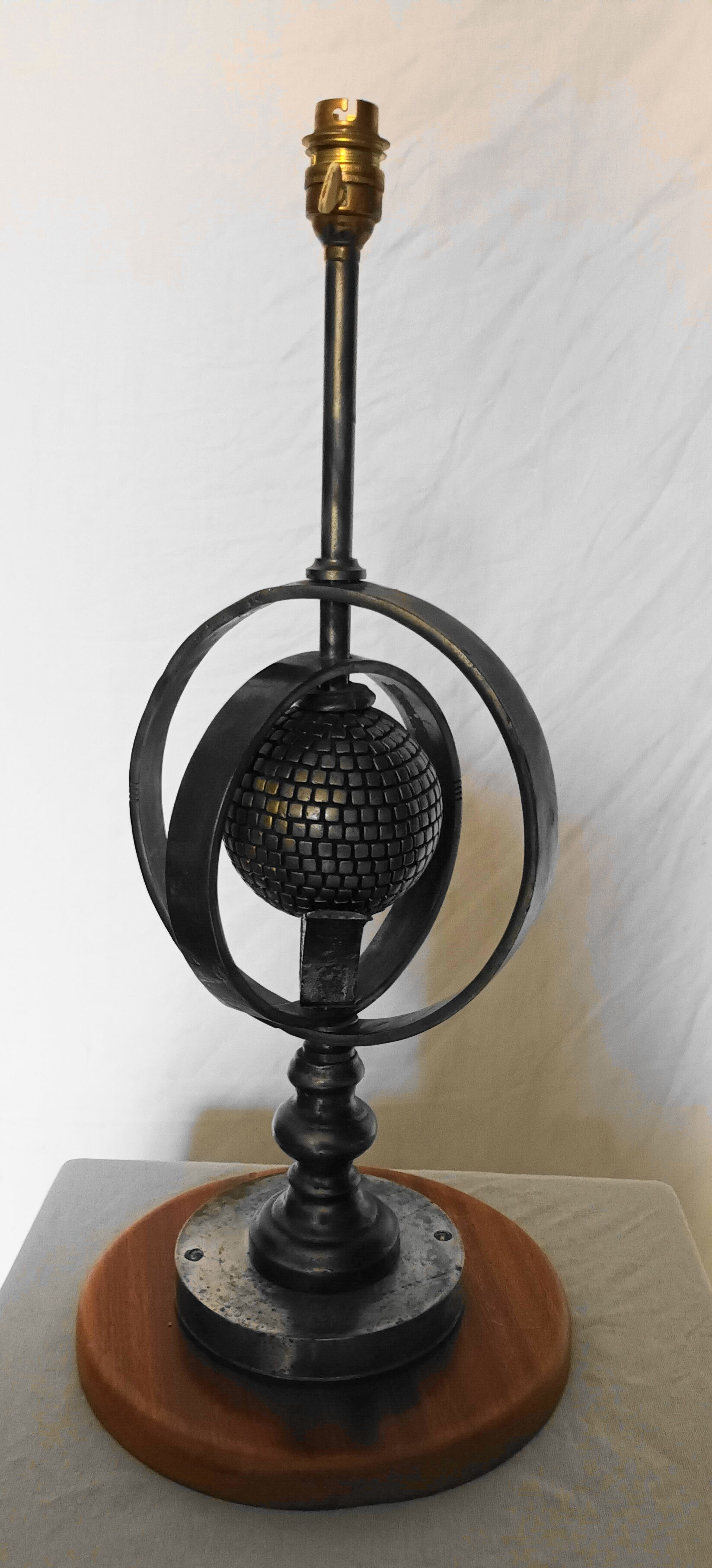 Wrought iron lamp with armillary sphere decorations