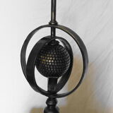 Wrought iron lamp with armillary sphere decorations